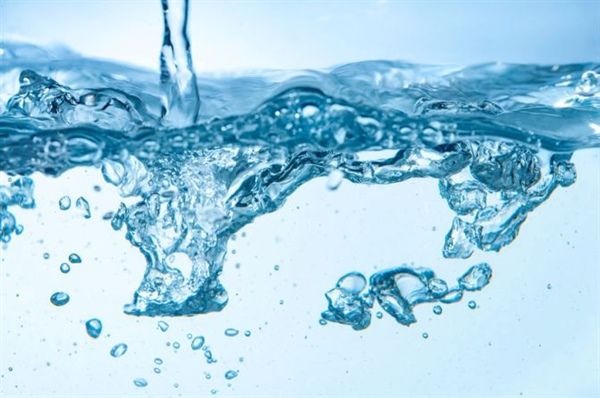 Purified water being poured