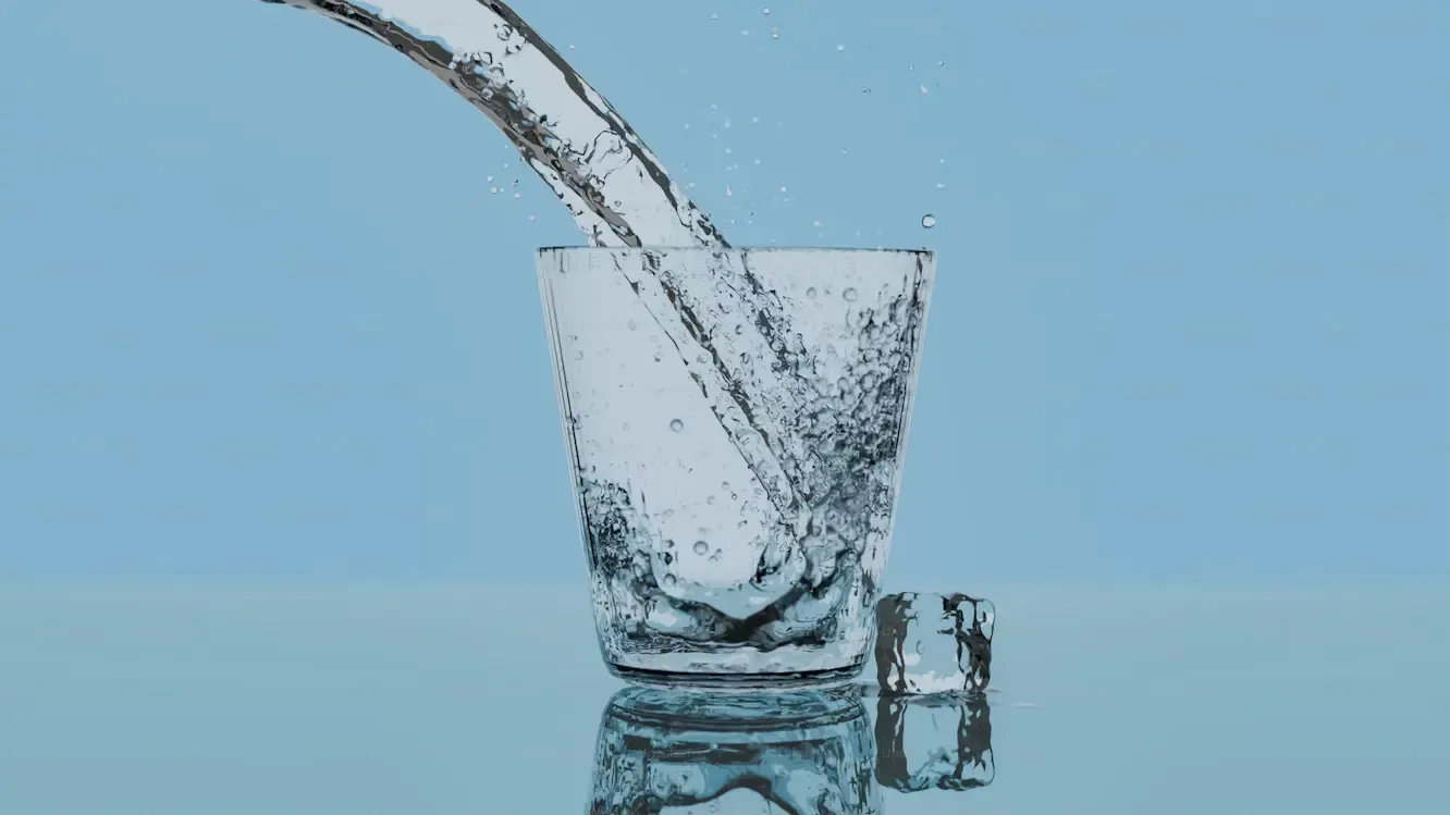 Water pouring into a glass